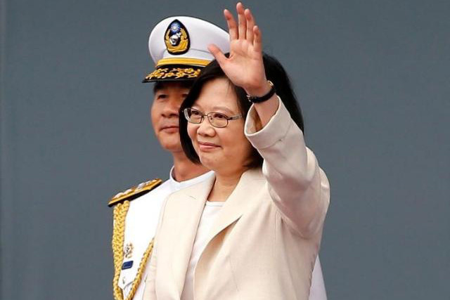 Taiwan’s President Tsai Ing-wen waves during an inauguration ceremony in Taipei, Taiwan May 20, 2016. REUTERS/TYRONE SIU
