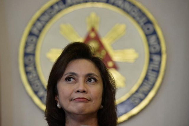 Philippines Vice President Leni Robredo listens to a reporter's question during a news conference following her resignation from her post in President Rodrigo Duterte's cabinet, at the Quezon City Reception House, Metro Manila, Philippines December 5, 2016. REUTERS/Ezra Acayan